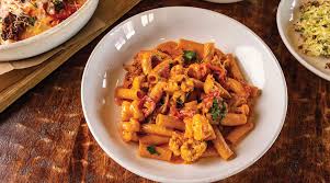 Trattoria Marcella signature dishes Toasted Ravioli
Rigatoni
Chicken Spiedini